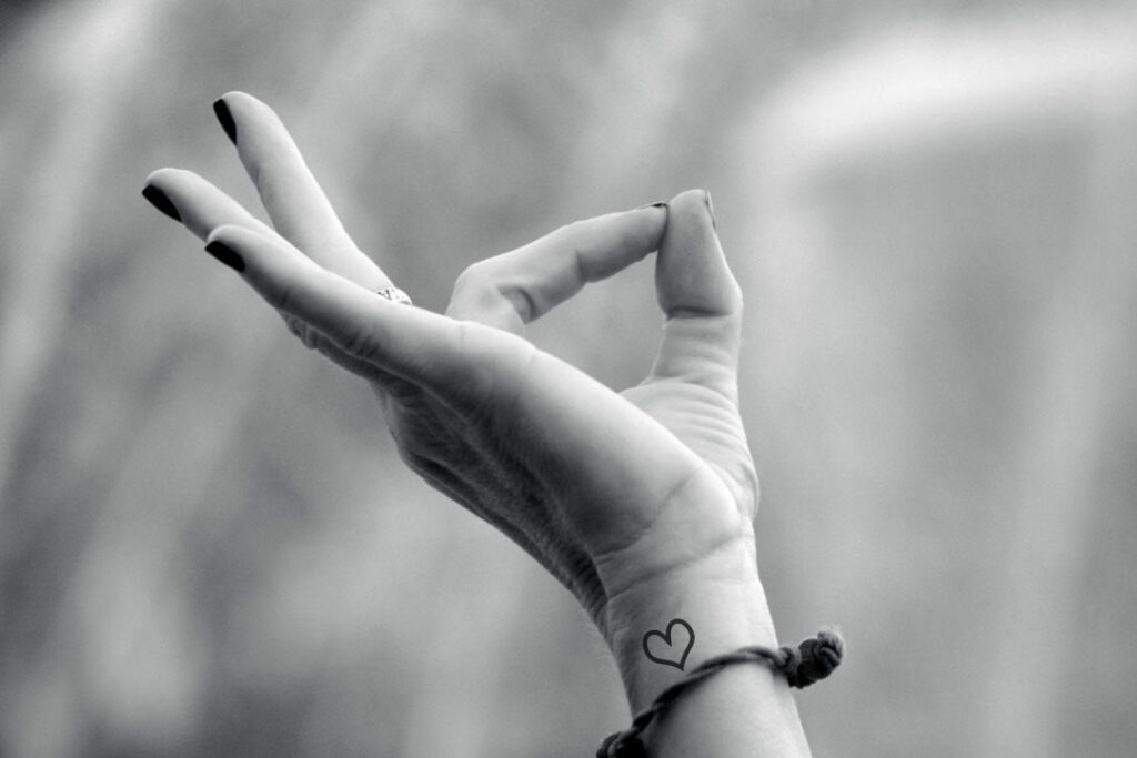 A henna painted hand is showing the mudra Gyan Mudra at the ghats of the  holy river Ganges, Stock Photo, Picture And Rights Managed Image. Pic.  IBR-4201344 | agefotostock